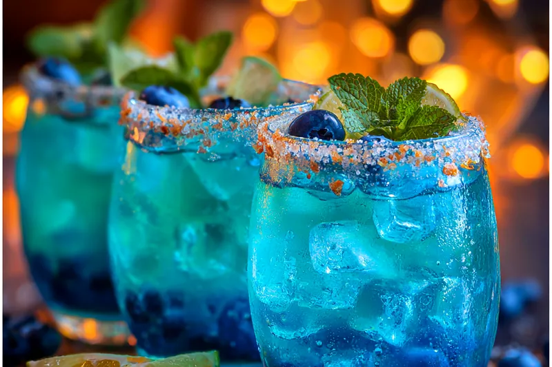 Fresh ingredients for Festive Blueberry Lime Beverage